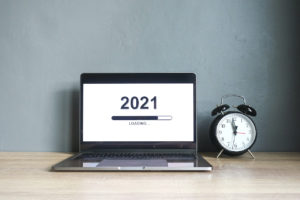 computer with 2021 and countdown clock