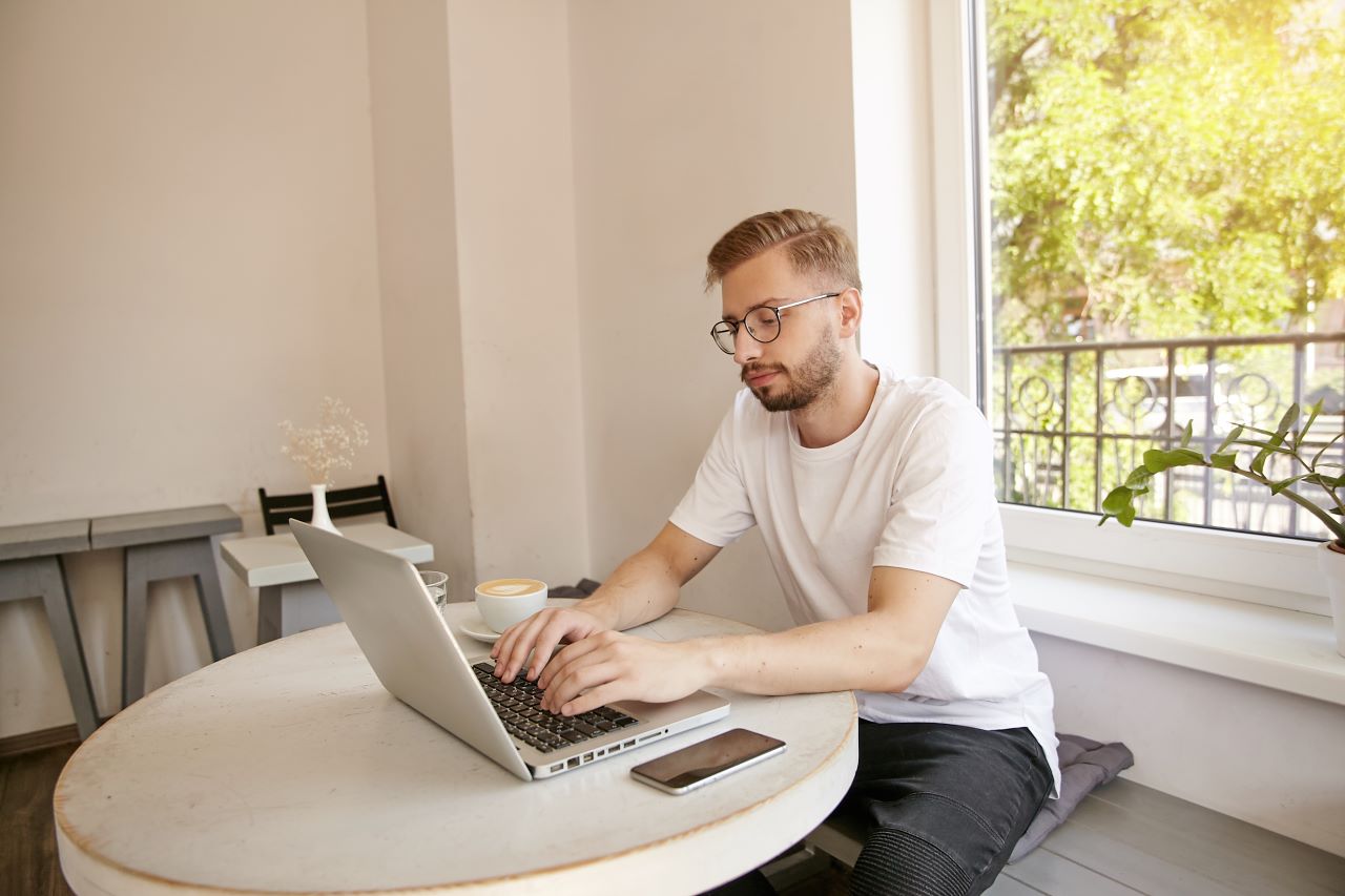 man on computer working from home